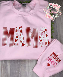 Valentine Mama hearts on her sleeve sweatshirt
